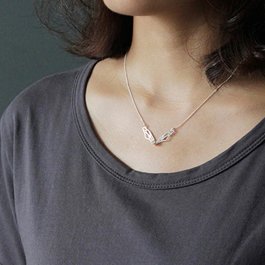 Hollow Butterfly Wings Necklace LFJF0063B on someone's neck- Tan Tan Gallery