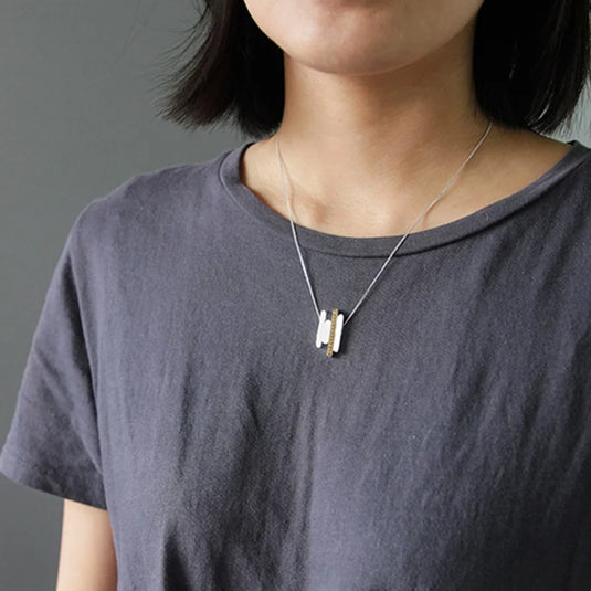 Minimal Parallel Necklace